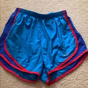 Nike shorts blue with red stripe